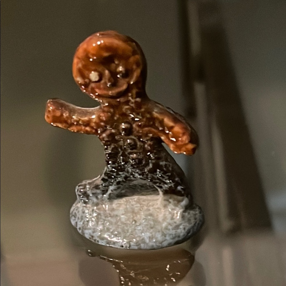 Brown and Gray Gingerbread Figurine